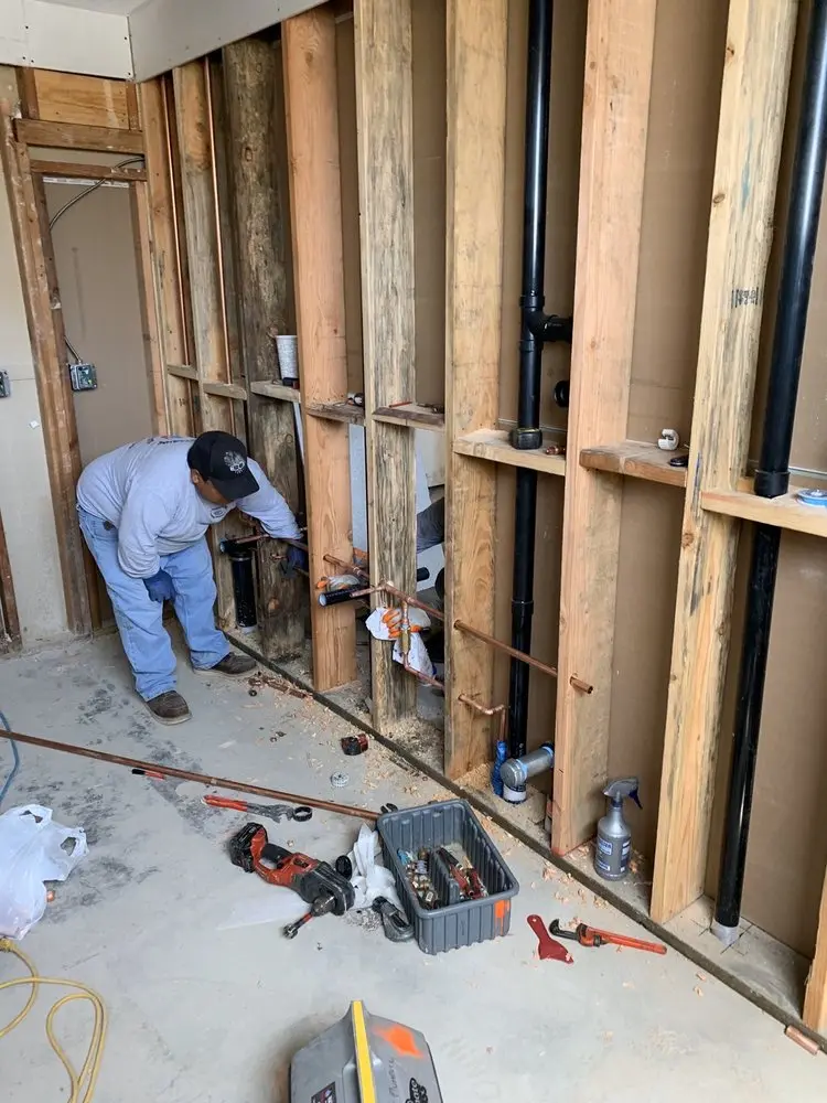 Commercial rough-in plumbing for Water Heater Replacement in Manor Village